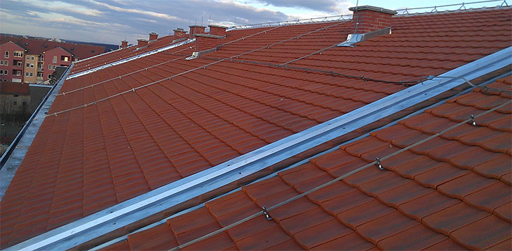 Roof plane with the diletation flashing of several housing units.