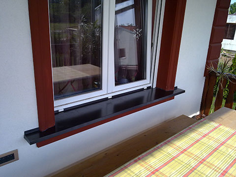 Window sill made of plasticized tin in the color according to clients wishes.